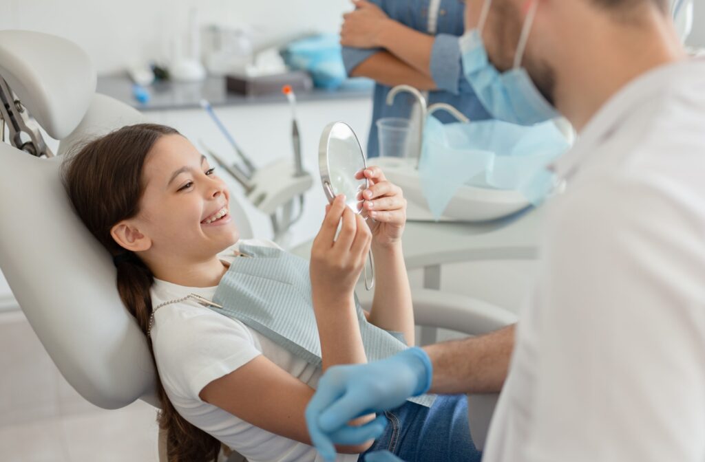 A child visits their dentist about their myobrace treatment.